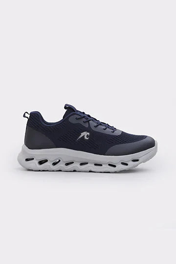 Navy blue athletic sneaker with breathable mesh upper and thick white cushioned sole