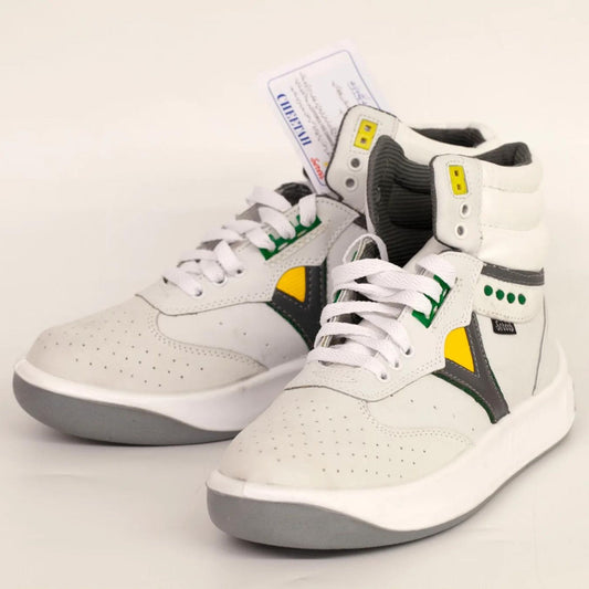 White and gray high-top sneakers with yellow and green accents, lace-up design on a white background.