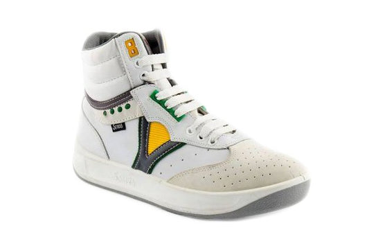 White high-top sneaker with green, yellow, and gray accents, perforated toe, side logo patch.