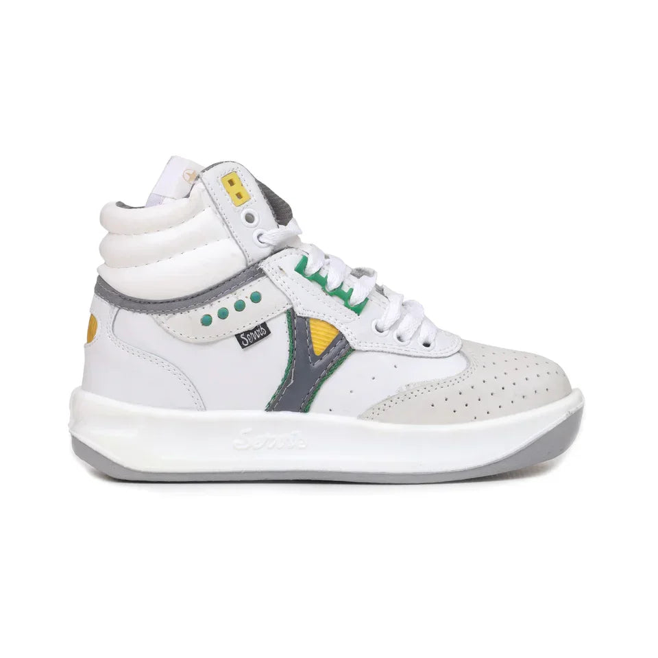 White high-top sneaker with grey, yellow, and green accents, perforated toe and padded collar