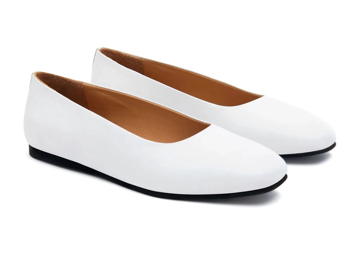 Pair of white ballet flats for women with a minimalist design and black soles
